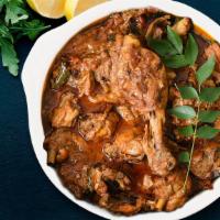 Traditional Kodi (Chicken) Curry · Deligthful chicken stewed in onion tomato based sauce flavoerd with ginger, garlic, pepper, ...