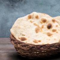 Tandoor Roti · Traditional and tasty flatbread made with wheat flour using a tandoor oven