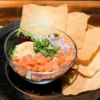 Smoked Poke (Tapas) · Chopped smoked Sashimi, red onion, spicy Miso sesame sauce and poached egg with Wonton chips...