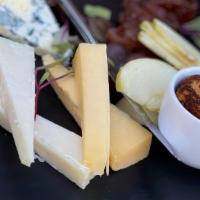 Cheese Plate · chef’s selection of three, artisan bread & accoutrements.