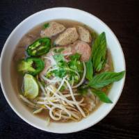 21. Regular Phở Combo · Rice noodle in flavorful beef broth served with rare steak, brisket, tendon, tripe and meatb...