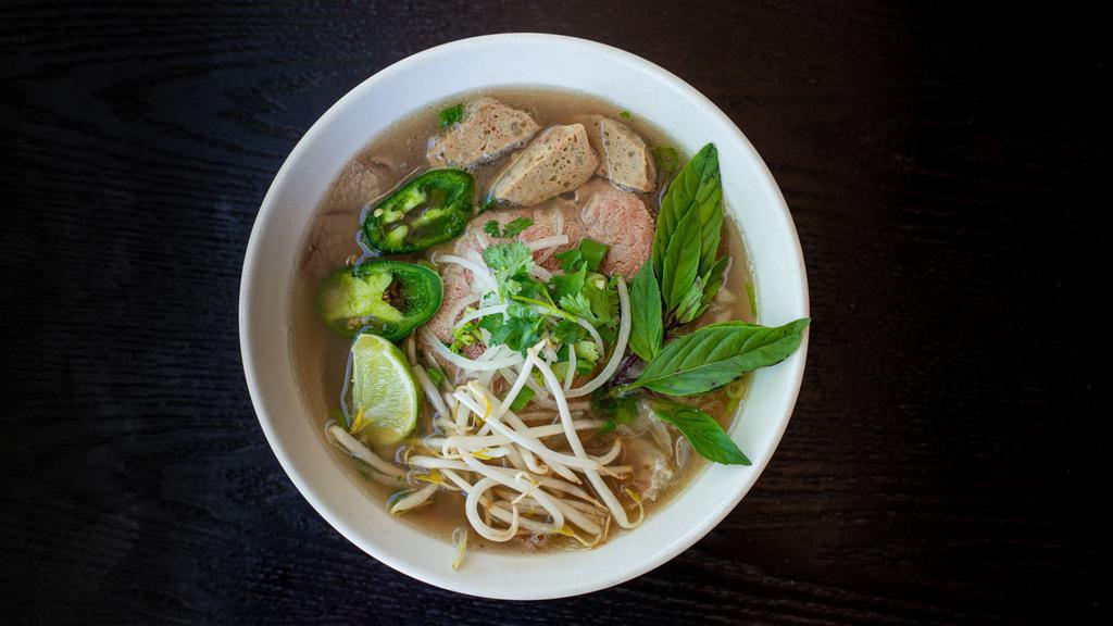 21. Regular Phở Combo · Rice noodle in flavorful beef broth served with rare steak, brisket, tendon, tripe and meatballs.