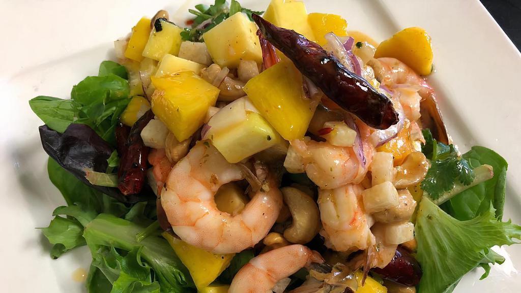 Mango Salad · Prawn, red onion, onion, bell pepper, chili paste with spicy lime dressing.