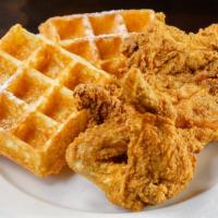 2 Pieces Chicken & Waffles · Served with your choice of Belgian style waffles (powdered sugar and maple syrup).