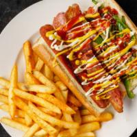 Street Dog · All beef hot dog wrapped in bacon, topped with grilled onions and jalapenos. Served with a s...