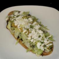 Huarache · Choice of Meat, Beans, Lettuce, Sour Cream, Salsa and Queso Fresco