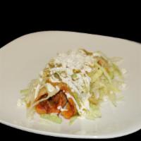 Tamales · Lettuce, Crema, Queso Fresco, and Green Salsa