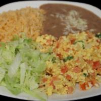 Huevos a la Mexicana
 · Scrambled Eggs, Tomato, Onion, and Pepper, Rice, Beans, Cheese and Lettuce