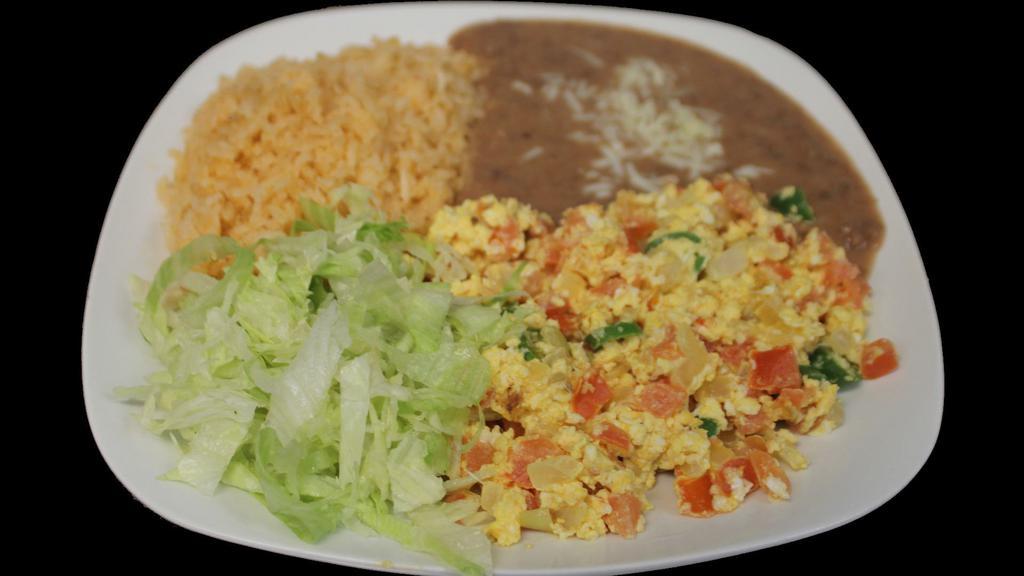 Huevos a la Mexicana
 · Scrambled Eggs, Tomato, Onion, and Pepper, Rice, Beans, Cheese and Lettuce