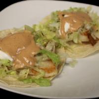 Fish Taco
 · Choice of Breaded or Grilled Fish, Lettuce, Sour Cream, and Chipotle sauce