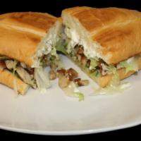 Torta · Choice of meat, lettuce, sour cream, avocado, jalapeno, and tomato. Substitute meat for Mila...