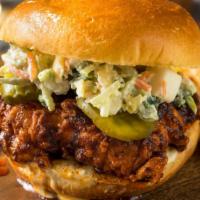 The Spicy Buffalo Chicken Sandwich · Hot & Delicious sandwich made with a perfectly battered & fried chicken breast, lettuce, tom...