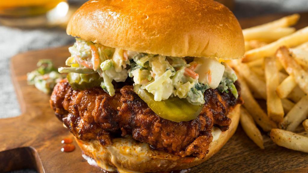 Grilled Buffalo Chicken Sandwich · Spicy buffalo sauce tossed on sizzling grilled chicken sandwich and pickles.