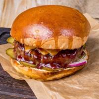 The BBQ Chicken Sandwich · Sweet barbeque sauce tossed on crispy- golden chicken breast sandwich and pickles.