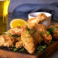 Traditional Cajun Sweet & Sour Wings · Classic bone-in traditional chicken wings tossed in cajun sweet & sour sauce.