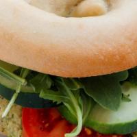 Bagel Sandwiches · Choose between:

- The Classic: Choice of Toasted Bagel + *Goatless Chz, Avocado, Tomato.

-...