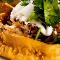 Sopes · Two corn masa shells, lightly fried and filled with your choice of chicken, carnitas, steak,...