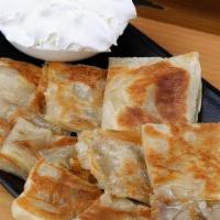 Banana Naan Bread (1) 香蕉飞饼 · Sweet naan bread with whipped cream is a delicious breakthrough compared with the traditiona...
