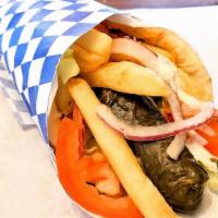 Dolmadaki Souvlaki  · Vegetarian Dolmades inside a fluffy pita, with tomatoes, onions, fries, lettuce and our refr...
