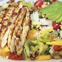 Chicken Tropical Salad · Romaine lettuce, jicama, sweet corn, mango, cherry, tomato, sliced avocado, cilantro, walnut...