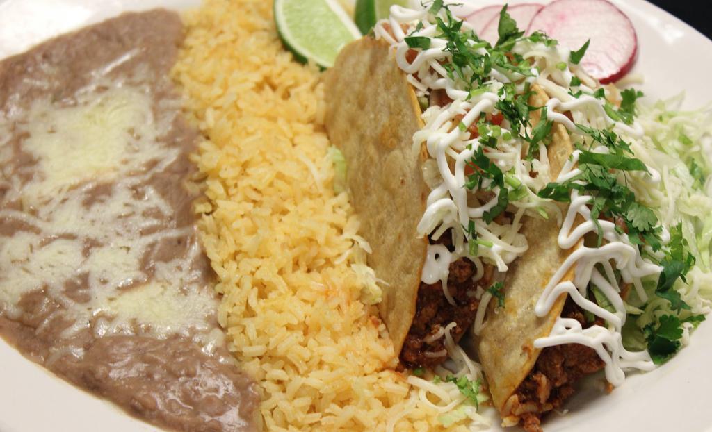 Crispy Taco · Any meat, rice, beans, lettuce, salsa, and cheese.