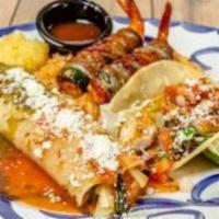 BAJA COMBO · Two bacon-wrapped shrimp, mahi-mahi fish taco and a shrimp Mazatlán enchilada. Served with r...