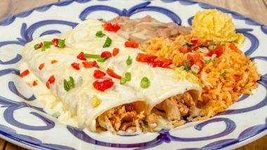 CHICKEN AND SOUR CREAM ENCHILADAS · Tender chicken simmered and smothered in a savory sour cream sauce topped with jack cheese. Served with refried beans and rice.
