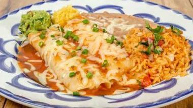 ENCHILADA RANCHERAS - CHEESE · Melted jack cheese with ranchera sauce served with guacamole, refried beans and rice.