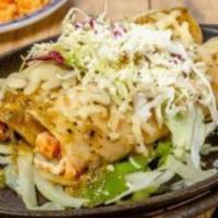 SIZZLING ENCHILADAS - GRILLED CHICKEN · Grilled chicken with fire-roasted tomatillo sauce and jack cheese. Served with frijoles de l...