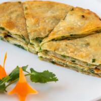 Green Onion Pancake 蔥油餅 · House special.