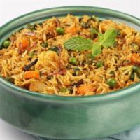 Vegetable Biryani · Rice aromatically flavored with indian spices & fried with mixed vegetables. Gluten free.