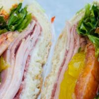 The Siciliano Sandwich · Prosciutto cotto (Italian ham), Italian salami, Italian mortadella and provolone cheese with...