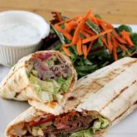 Lamb Shawarma · Wrapped in Homemade Flat Bread with Cucumbers, Tomatoes, Pickled Onions, Shredded Lettuce, T...
