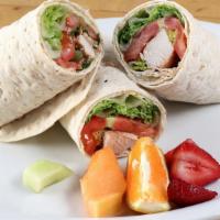 Bacon Chicken Caesar Wrap · Parmesan Cheese, Caesar Salad, Tomatoes and Mayo wrapped in Lavash Bread and
Served with Fre...