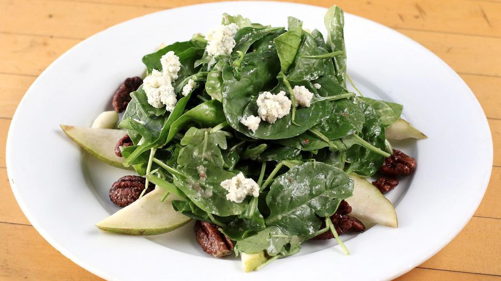 Pear and Bleu Cheese Salad · Wild Arugula, Baby Spinach, Sliced Pears, Candied Peacans, Bleu Cheese and Pear Vinaigrette
