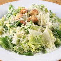 Caesar Salad · Romaine Hearts with Caesar Dressing, Parmesan Cheese and Croutons.