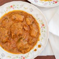 Chicken Karahi · Northwestern and Himalayan region specialty. Diced chicken cooked with northern spices, herb...