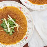 26. Haleem · Combination of lentils and barley. Mixed with chicken or beef. Slow cooked in authentic spic...