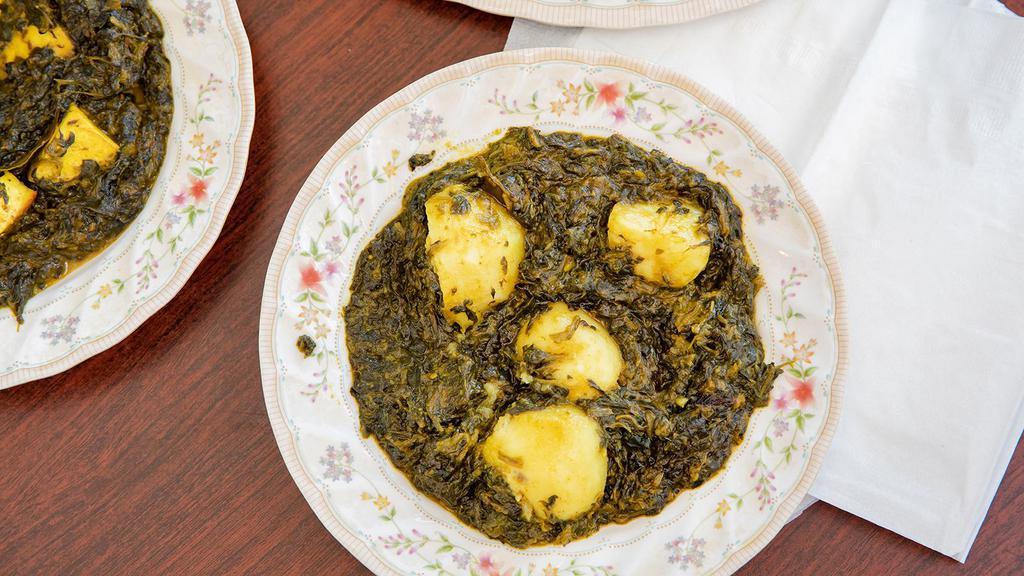 30. Palak Aloo Methi · The pride of Punjabi farmland. A wonderful combination of freshly picked spinach greens. Cooked with young potatoes and 