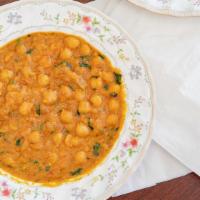 27. Kabli Channa · Chickpeas delicately cooked in butter and 