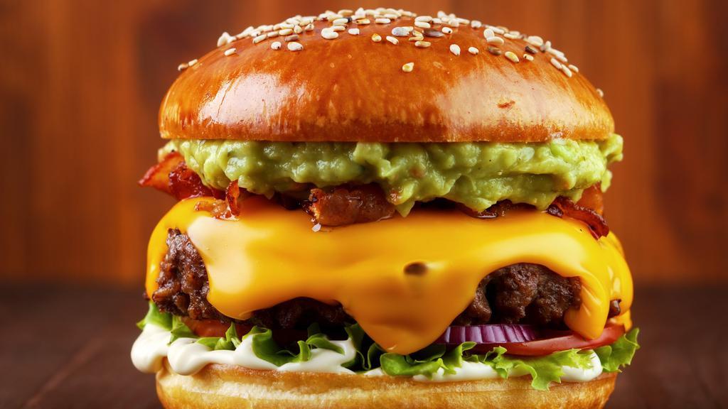 South Burger · ½ lb niman ranch beef, topped with homemade spicy guacamole, jalapeño mayo, lettuce, and pepper jack cheese.