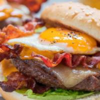 Morning Dew Burger · Beef, topped with fried egg, apple wood bacon, cheddar cheese, lettuce, tomato, onion, and c...