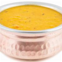 Dal · Traditional Indian split pea soup seasoned with fresh ground spices.