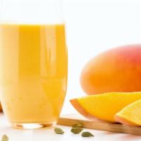 Mango Lassi · Refreshing mango and yogurt beverage.