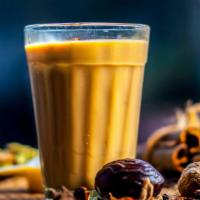 Masala Chai · Indian black tea flavored with ginger and our secret blend of spices.