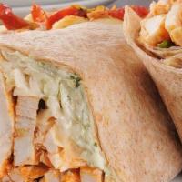Grilled Chicken wrap  · Grilled chicken breast, roasted red peppers, organic mixed greens, fresh sliced tomatoes , s...