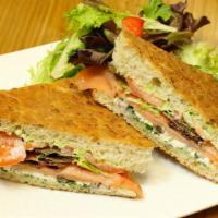Smoked salmon  · Smoked salmon, pesto mayo, diced capers, diced olives, Swiss cheese, sliced tomatoes, organi...