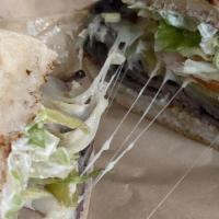 2. Roast Beef, Mild Green Chili Peppers and Pepper Jack Cheese · Heated with red onion, tomato, lettuce, and garlic mayo.
