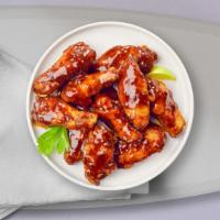 BBQ Pique Chicken Wings · Baked to perfection chicken wings, smothered with barbecue sauce.