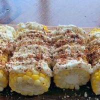 Esquite de Elote Vegan · 2 Mexican street corn cut in half, with vegan mayonnaise, vegan sour cream, queso vegan parm...